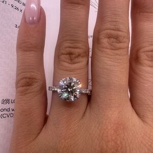 3.03 carat e vs1 round diamond engagement ring pavé band double prongs